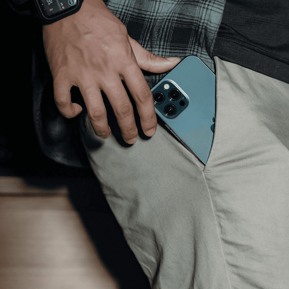 Person with iPhone in pocket